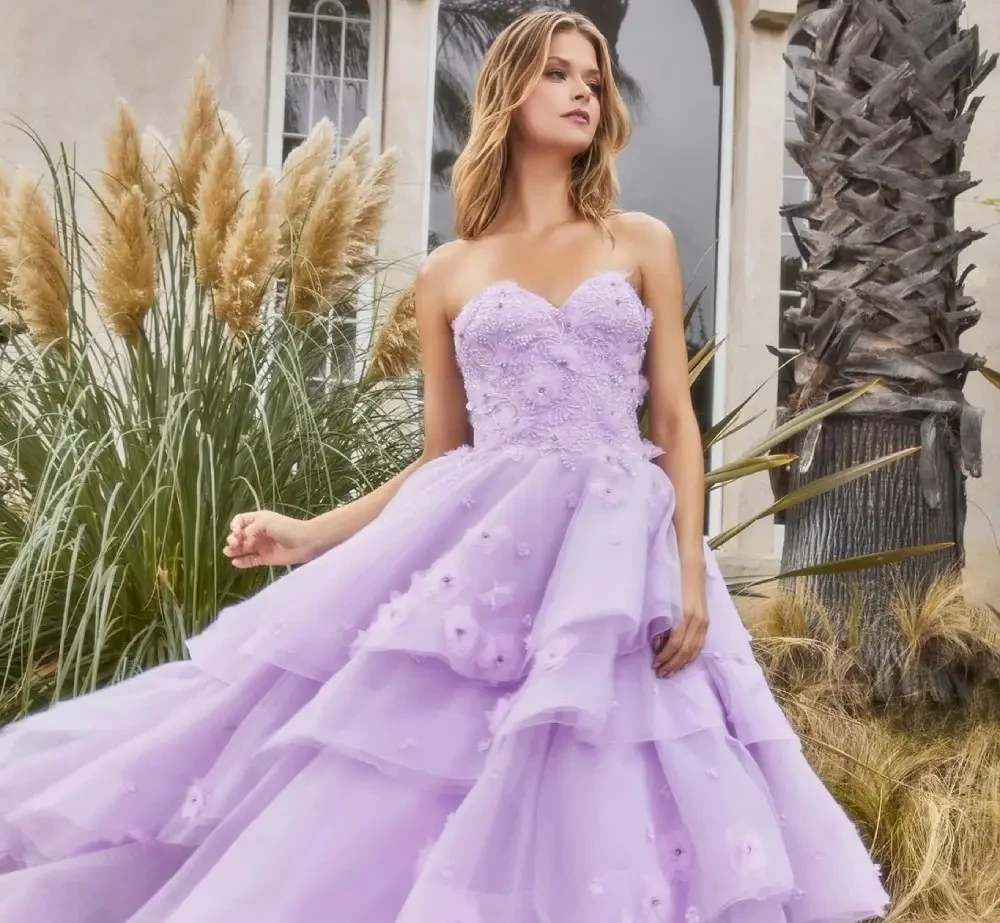 Model wearing a blue dress